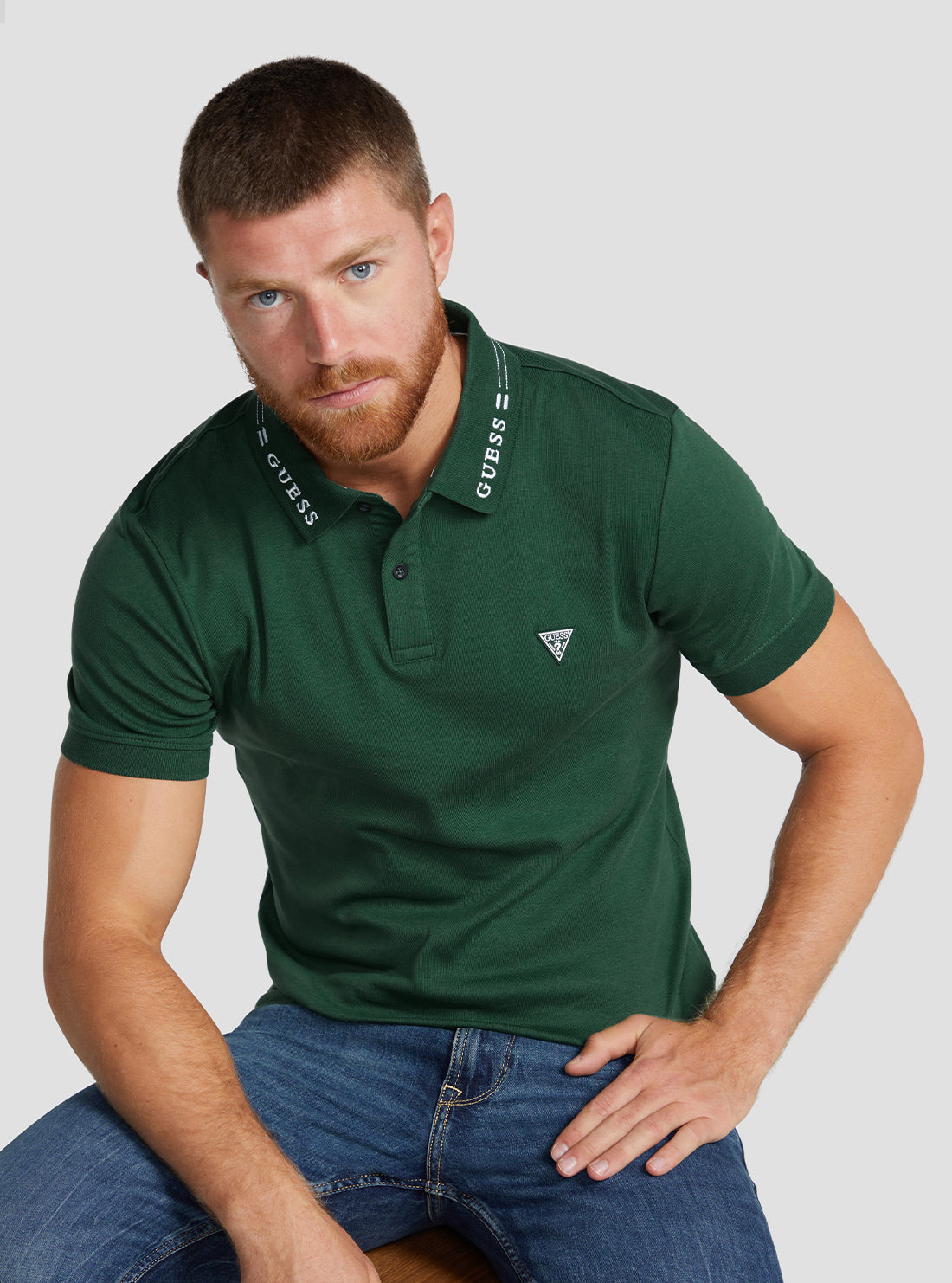 GUESS Men's Eco Green Nolan Logo Polo T-Shirt M3RP66KBL51 Seated View