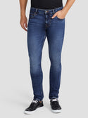 GUESS Men's Eco Low Rise Slim Tapered Denim Jeans In Kent Wash M3RAS2D4TB3 Front View