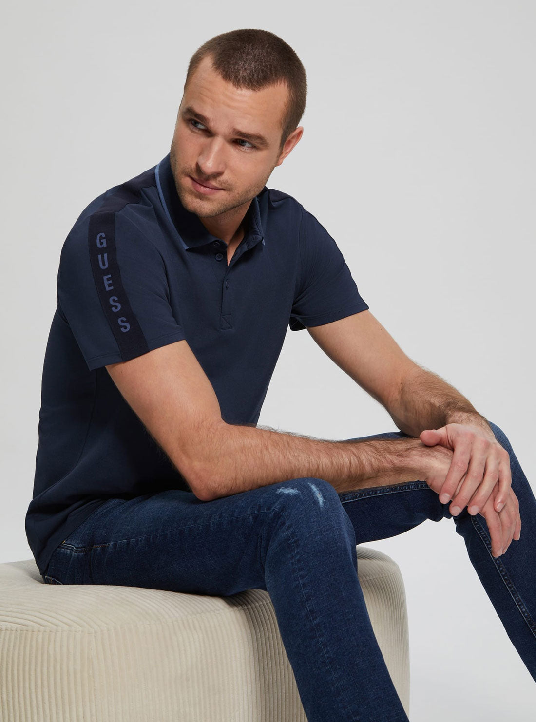 Navy Blue Paul Pique Tape Polo T-Shirt | GUESS Men's Apparel | lifestyle view