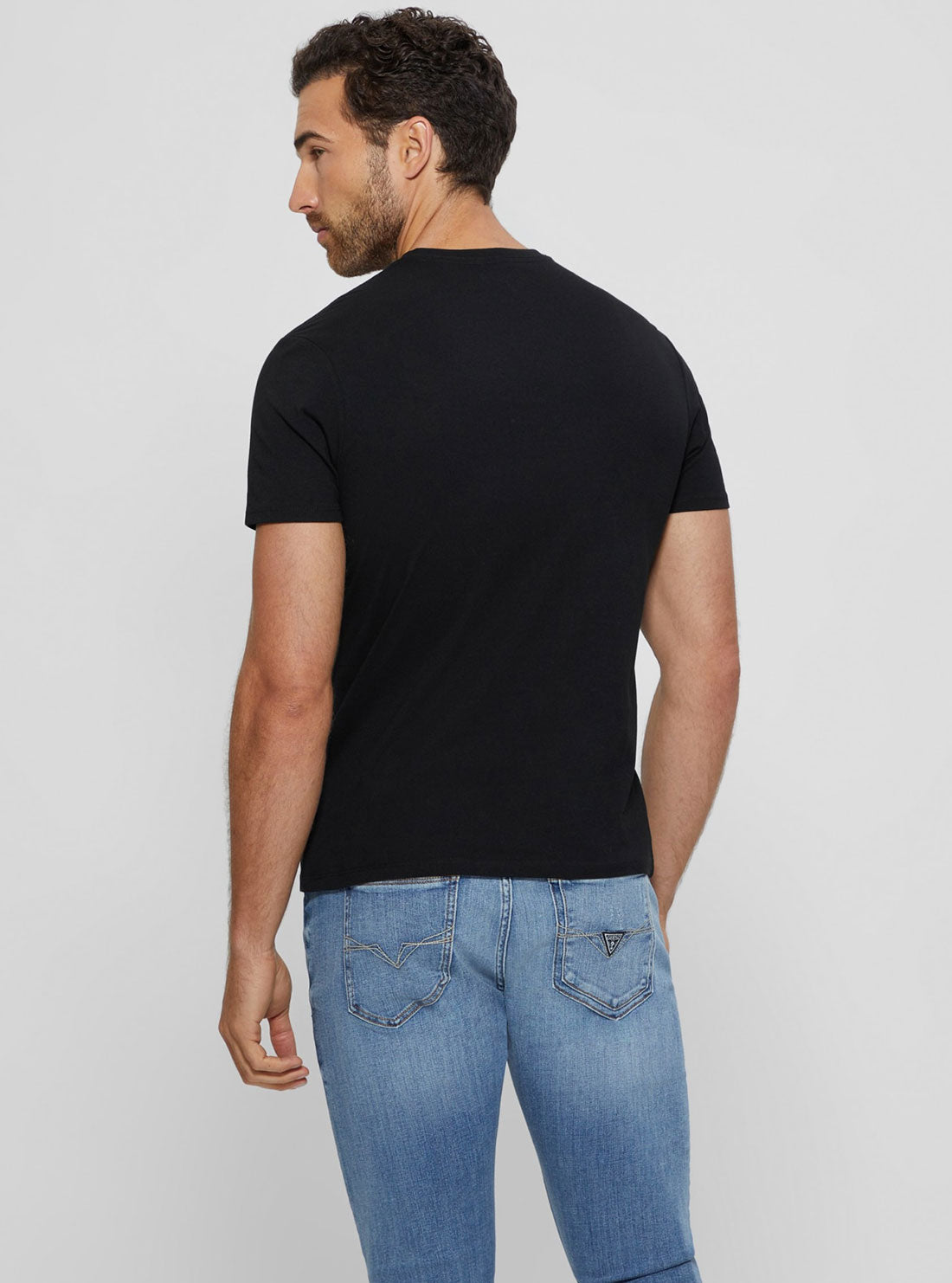 Black Palm Print Triangle Logo T-Shirt | GUESS men's apparel | back view