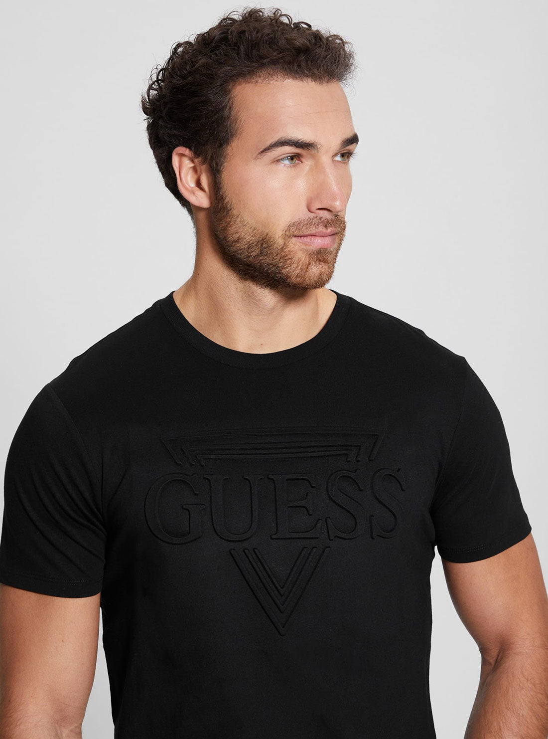 Eco Black Embossed Logo T-Shirt | GUESS Men's | detailed view