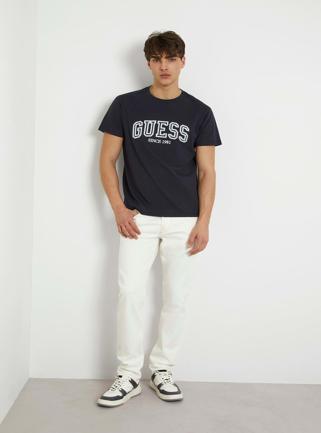 White Low-Rise Slim Tapered Jeans in White Wash