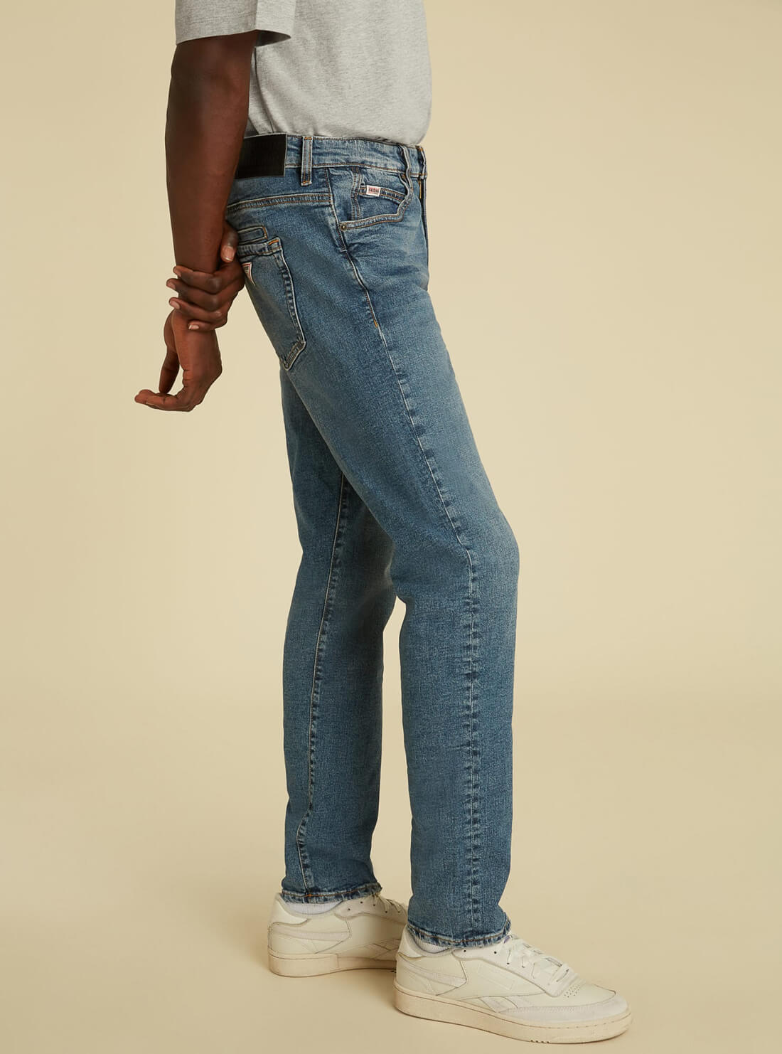 GUESS Mens GUESS Originals Mid-Rise Slim Straight Denim Jeans in Vintage Stone Wash  M1GA05R49T0 Model Side View