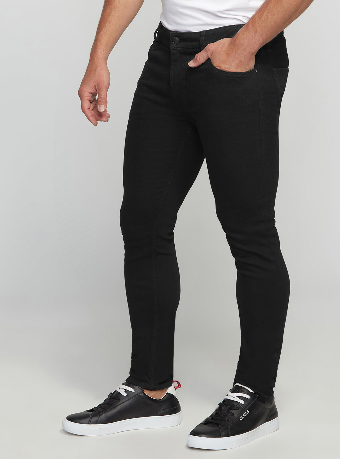GUESS Men's Eco Low-Rise Slim Chris Denim Jeans In Carry Black Wash M2YA27D4Q51 Side View
