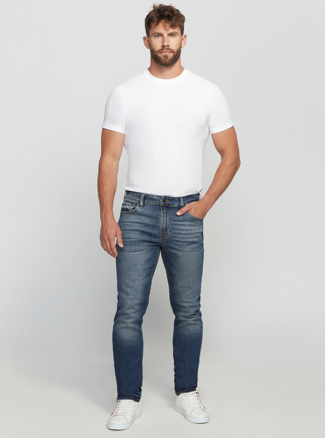 GUESS Men's Eco Low-Rise Slim Tapered Denim Jeans In Stratus Blue Wash MBGAS230411 Full View