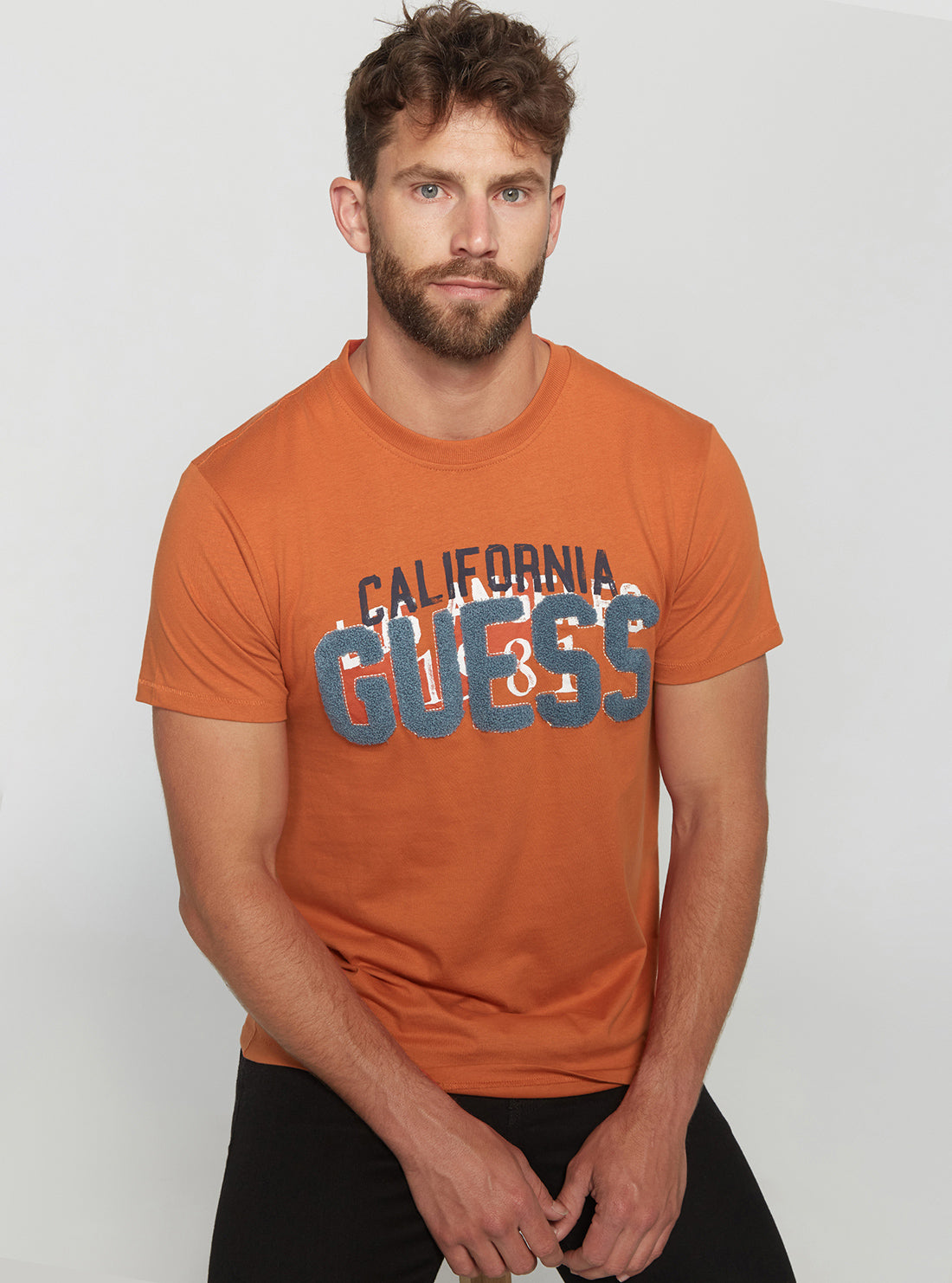 GUESS Men's Eco Orange Arzen T-Shirt M2BI38K8FQ4 Seated View