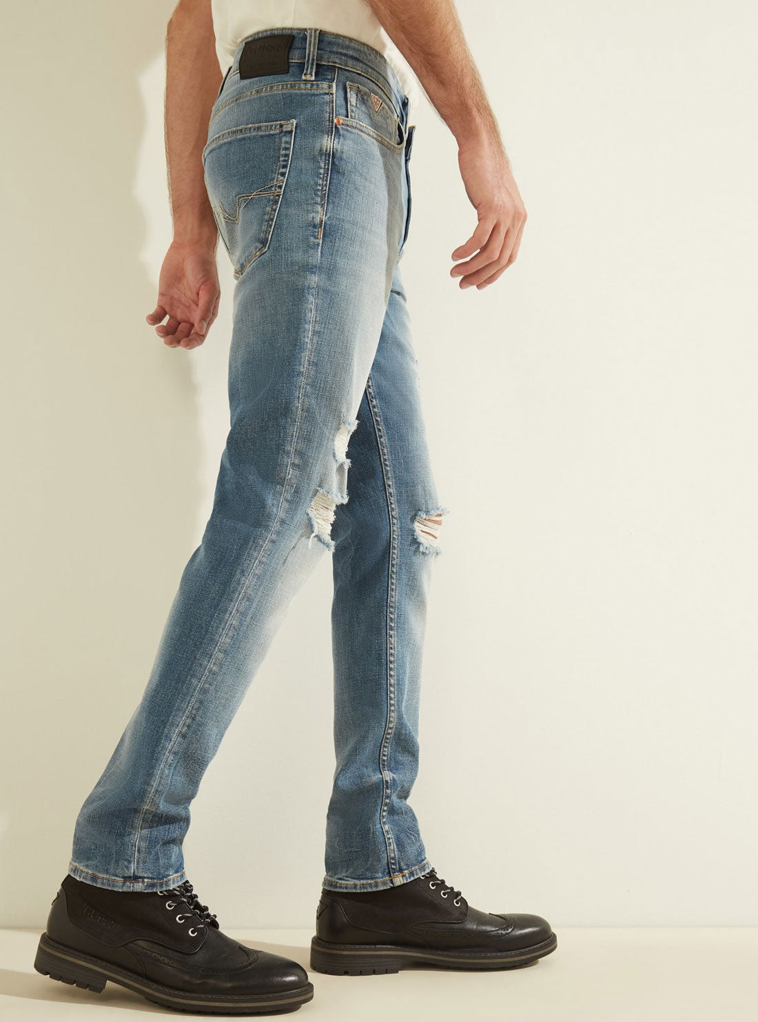 GUESS Mens Mid-Rise Slim Tapered Denim Jean in Light Tide Wash    MBGAS23041B Side View